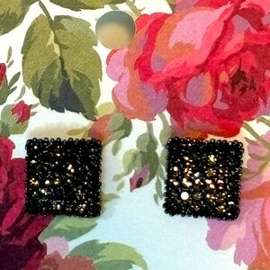 Dark studded black square post earrings